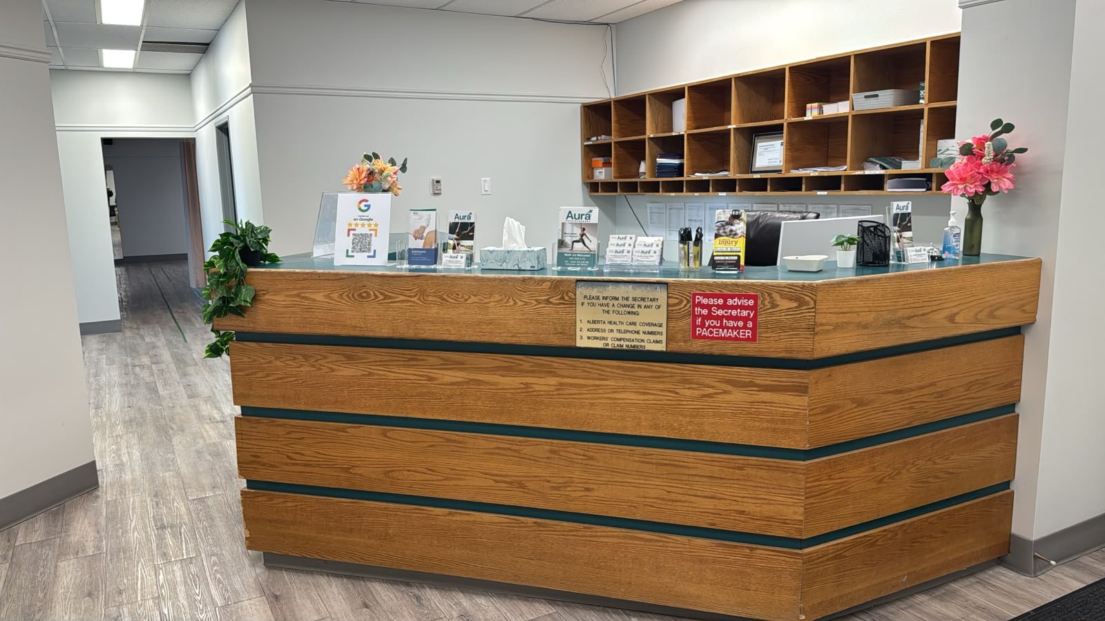 Front desk at Aura Physiotherapy where patients check in for a first visit